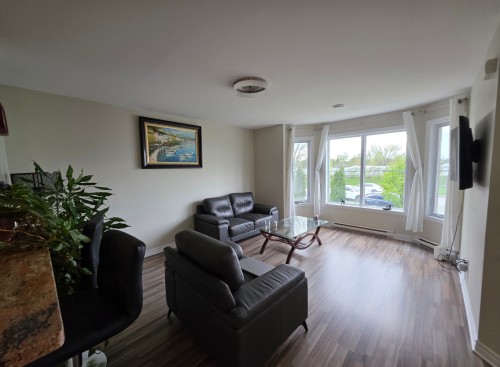 Living Room - 4-5645 Boul. Chevrier, Brossard, QC - Indoor Photo Showing Living Room