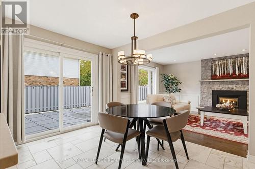 Eat in kitchen - 67 Honeysuckle Crescent, Hamilton, ON - Indoor Photo Showing Dining Room With Fireplace