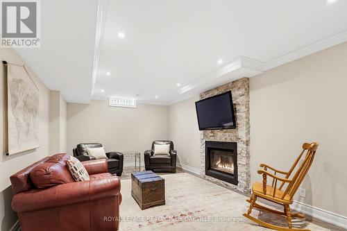 Inlaw family room - 67 Honeysuckle Crescent, Hamilton, ON - Indoor With Fireplace