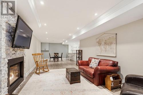 Inlaw family room - 67 Honeysuckle Crescent, Hamilton, ON - Indoor Photo Showing Living Room With Fireplace