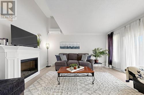 146 - 311 Milestone Crescent, Aurora, ON - Indoor Photo Showing Living Room With Fireplace