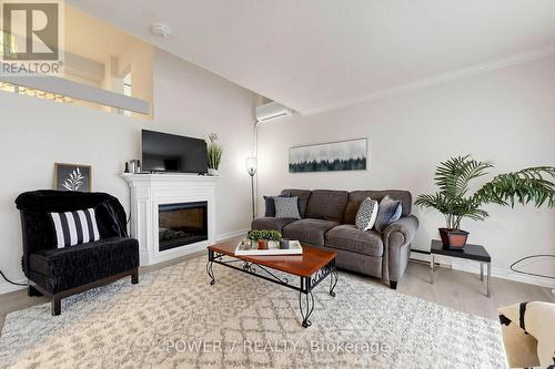 146 - 311 Milestone Crescent, Aurora, ON - Indoor Photo Showing Living Room With Fireplace