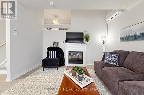 146 - 311 Milestone Crescent, Aurora, ON - Indoor Photo Showing Living Room With Fireplace