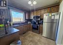 15 Mackenzie Drive, Yorkton, SK  - Indoor Photo Showing Kitchen With Double Sink 