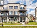 218 - 2550 Castlegate Crossing, Pickering, ON  - Outdoor With Facade 