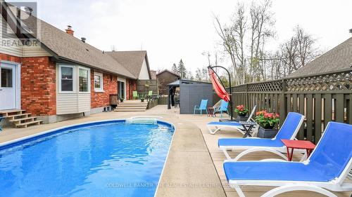 33 Elvyn Crescent, Oro-Medonte, ON - Outdoor With In Ground Pool With Deck Patio Veranda