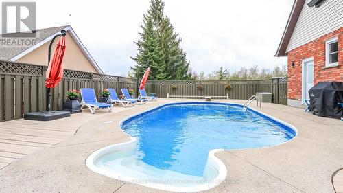 33 Elvyn Crescent, Oro-Medonte, ON - Outdoor With In Ground Pool With Deck Patio Veranda