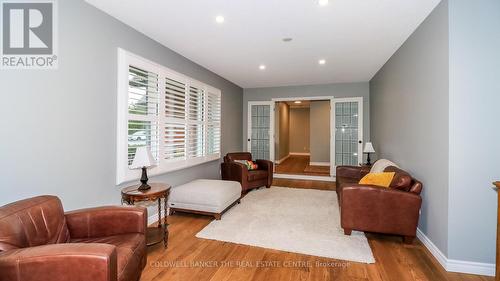 Living Room with French Doors - 33 Elvyn Crescent, Oro-Medonte, ON - Indoor Photo Showing Living Room