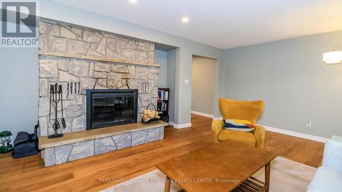Family Room Wood Burning Fireplace - 33 Elvyn Crescent, Oro-Medonte, ON - Indoor Photo Showing Living Room With Fireplace