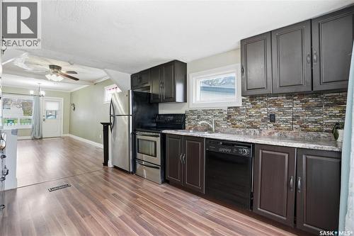 1115 J Avenue N, Saskatoon, SK - Indoor Photo Showing Kitchen With Double Sink