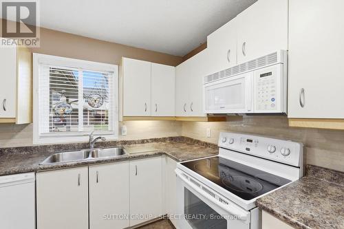 1 - 151 Bonaventure Drive, London East (East I), ON - Indoor Photo Showing Kitchen With Double Sink