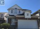 Two-story residence featuring a brick and siding exterior with an integrated garage - 350 Havendale Crescent, Waterloo, ON  - Outdoor 