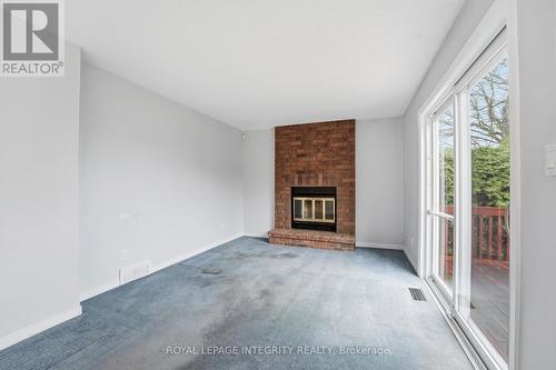 Family Room - 2133 Lenester Avenue, Ottawa, ON - Indoor Photo Showing Other Room With Fireplace