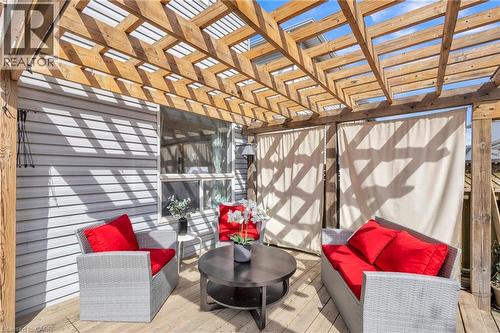 Outdoor wood deck featuring a slatted pergola overhead - 425 Erinbrook Drive, Kitchener, ON - Indoor