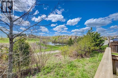 Expansive outdoor space featuring a body of water, lush green areas, and mature trees - 19 Shoreacres Drive, Kitchener, ON - Outdoor With View