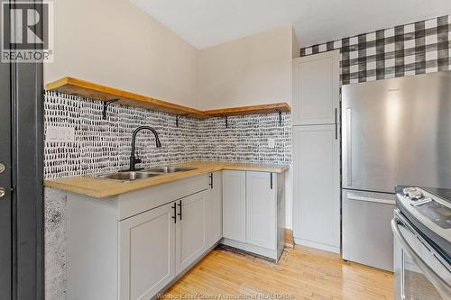 557 Moy Ave, Windsor, ON - Indoor Photo Showing Kitchen With Double Sink