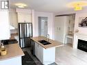 49 Memon Place, Markham, ON  - Indoor Photo Showing Kitchen With Fireplace With Stainless Steel Kitchen With Double Sink 