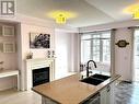 49 Memon Place, Markham, ON  - Indoor Photo Showing Kitchen With Fireplace With Double Sink 