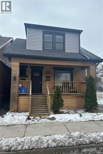 View of front of property featuring covered porch - 1090 Cannon Street E, Hamilton, ON - Outdoor With Deck Patio Veranda