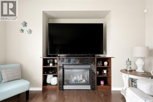 6902 Maple Vista Drive, Regina, SK - Indoor Photo Showing Living Room With Fireplace