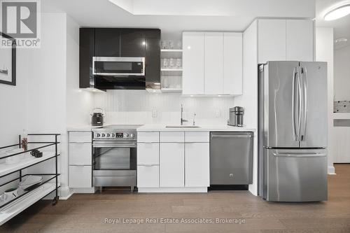 2301 - 33 Shore Breeze Drive, Toronto, ON - Indoor Photo Showing Kitchen With Upgraded Kitchen