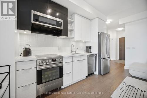 2301 - 33 Shore Breeze Drive, Toronto, ON - Indoor Photo Showing Kitchen With Upgraded Kitchen
