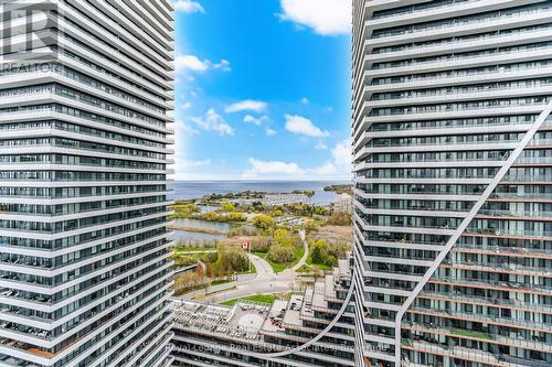 2301 - 33 Shore Breeze Drive, Toronto, ON - Outdoor With Balcony With Facade