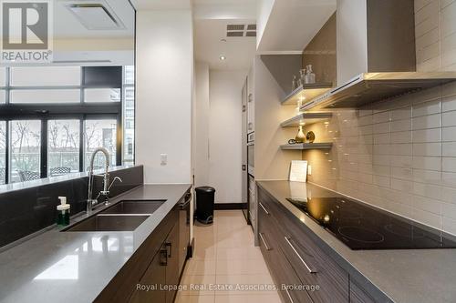 2301 - 33 Shore Breeze Drive, Toronto, ON - Indoor Photo Showing Kitchen With Double Sink