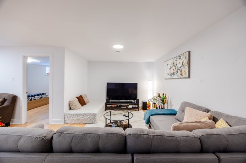 Salle familiale - 6255 Rue Cortot, Brossard, QC - Indoor Photo Showing Living Room