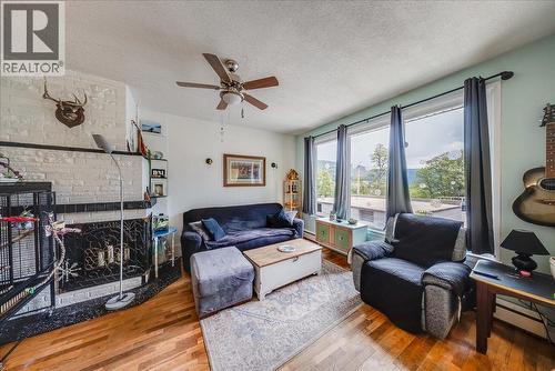 490 Austad Lane, Trail, BC - Indoor Photo Showing Living Room With Fireplace