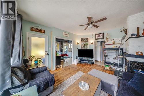 490 Austad Lane, Trail, BC - Indoor Photo Showing Living Room With Fireplace