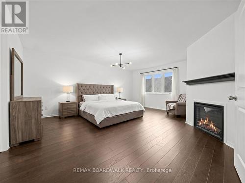 Virtually Staged - 333 Haliburton Heights, Ottawa, ON - Indoor Photo Showing Bedroom With Fireplace