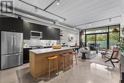 202 - 747 QUEEN STREET E Toronto, ON M4M 1H3