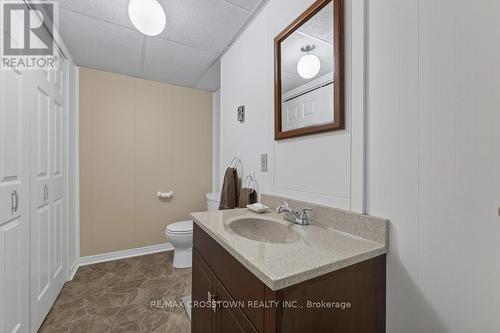 Lower 2 piece bathroom and pump room - 50 Withall Grove, Tiny, ON - Indoor Photo Showing Bathroom