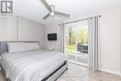 Primary bedroom has patio access - 