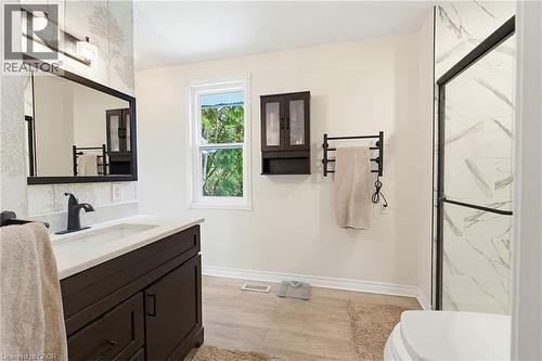 updated ensuite w/towel warmer, glass shower & vanity - 10 Huisman Lane, Hamilton, ON - Indoor Photo Showing Bathroom