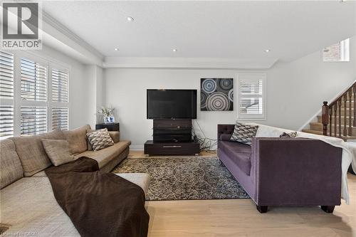 Bright living space featuring light wood-finish flooring - 4236 Prudham Avenue, Burlington, ON - Indoor Photo Showing Living Room