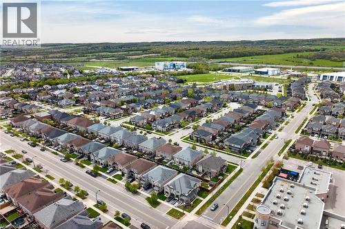 Aerial perspective showcasing a residential neighborhood with uniform street planning - 4236 Prudham Avenue, Burlington, ON - Outdoor With View