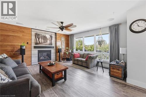 8 Delrex Boulevard, Georgetown, ON - Indoor Photo Showing Living Room With Fireplace
