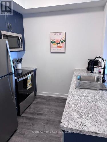 416 - 5055 Greenlane Road, Lincoln (Lincoln Lake), ON - Indoor Photo Showing Kitchen