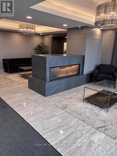 416 - 5055 Greenlane Road, Lincoln (Lincoln Lake), ON - Indoor With Fireplace