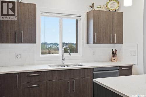 214 142 Pawlychenko Lane, Saskatoon, SK - Indoor Photo Showing Kitchen With Double Sink
