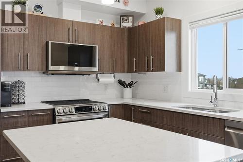 214 142 Pawlychenko Lane, Saskatoon, SK - Indoor Photo Showing Kitchen With Double Sink With Upgraded Kitchen