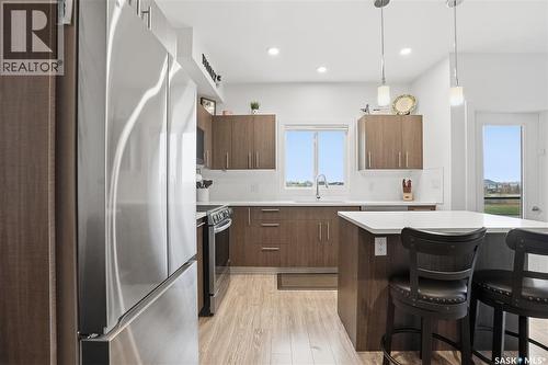 214 142 Pawlychenko Lane, Saskatoon, SK - Indoor Photo Showing Kitchen With Stainless Steel Kitchen With Upgraded Kitchen
