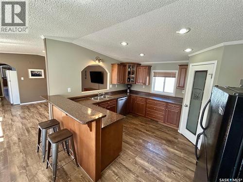607 Beharrel Street, Oxbow, SK - Indoor Photo Showing Kitchen With Double Sink