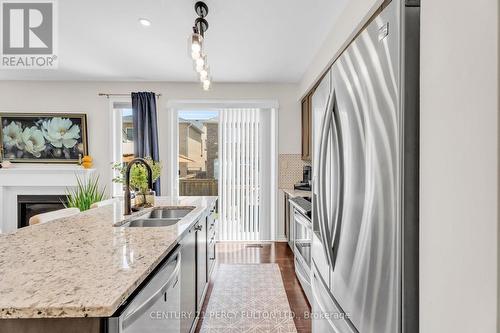 458 Etheridge Avenue, Milton, ON - Indoor Photo Showing Kitchen With Stainless Steel Kitchen With Double Sink With Upgraded Kitchen