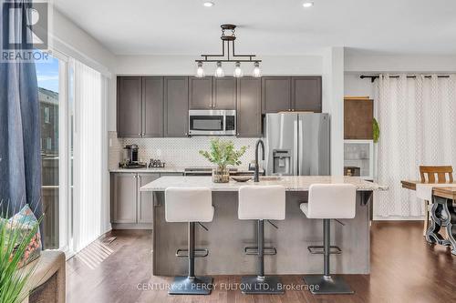458 Etheridge Avenue, Milton, ON - Indoor Photo Showing Kitchen With Stainless Steel Kitchen With Upgraded Kitchen