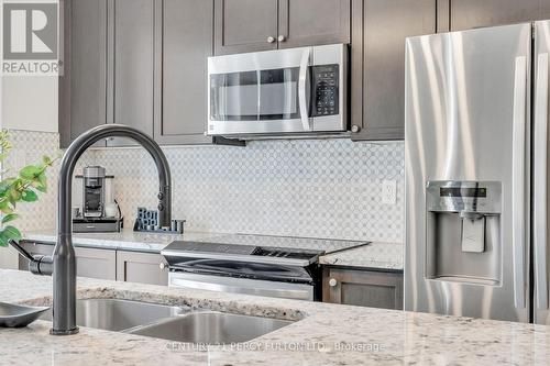 458 Etheridge Avenue, Milton, ON - Indoor Photo Showing Kitchen With Stainless Steel Kitchen With Double Sink With Upgraded Kitchen