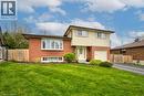 Split-level residence featuring a brick facade and light-colored siding - 34 Westwood Crescent, Kitchener, ON  - Outdoor 