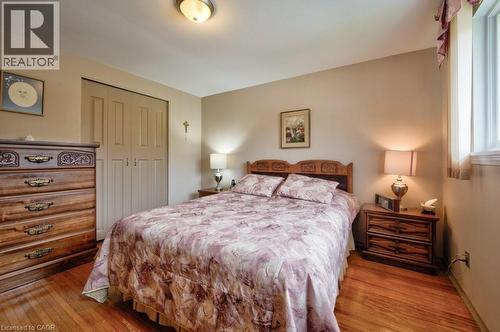 Wood-finish flooring throughout - 34 Westwood Crescent, Kitchener, ON - Indoor Photo Showing Bedroom